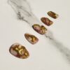 Rose Gold Marble with Dimensional Gold Nails - Image 2